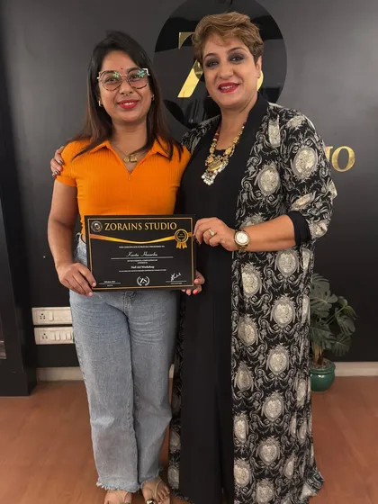 Celebrating another graduate from our nail art program. We are dedicated to providing the skills needed for a successful career.