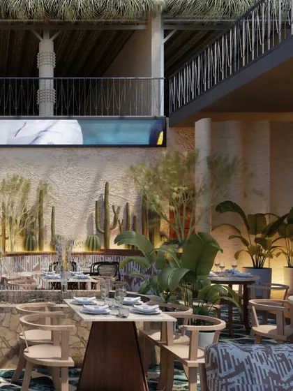 Another view of the multi-level dining area, showing how the different zones are connected. The design encourages exploration, with each corner offering a new perspective and experience.