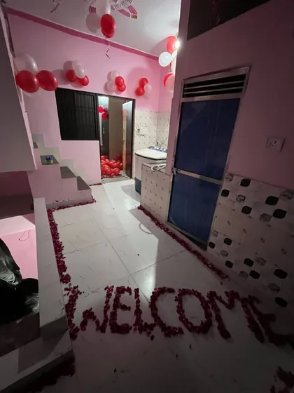 The entrance to a 'Just Married' surprise. I created a pathway using rose petals, spelling out 'WELCOME' to greet the couple right from the doorstep.