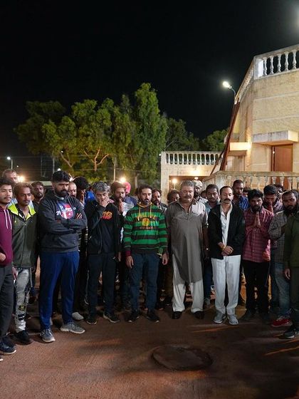 A team briefing on location at night for 'Aavesham'. We walk through the entire sequence with the stunt crew before shooting to make sure everyone knows their role.