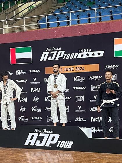 On the podium at the Abu Dhabi AJP Tour. One of our competitors stands proud after a day of tough fights and great performances.