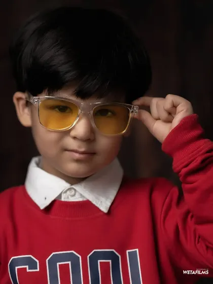 For the little man with a big personality. Our 'Cool Kid' theme lets your child's confidence shine with fun outfits and accessories like these trendy glasses for a modern studio portrait.