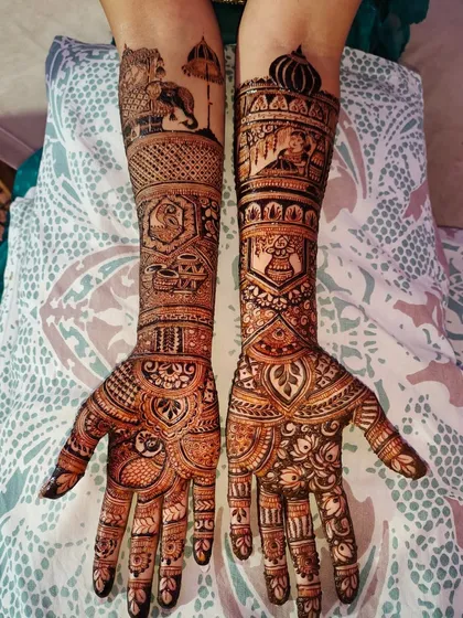 I love bringing a bride's story to life. This custom bridal design features traditional motifs like elephants and a palanquin scene, making the henna deeply personal and unique to her wedding story.