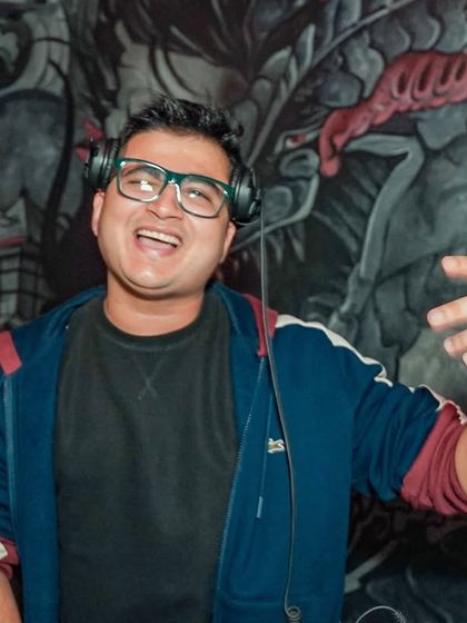 Pure joy. A candid laugh while interacting with the crowd at Takumi.