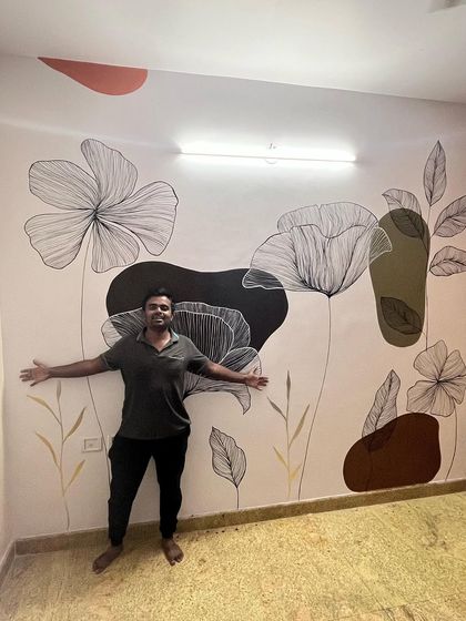 This boho-style mural is a milestone for me. The design, featuring large, linear flowers and abstract shapes, was recognized by a major publication, which was an amazing push for my work.