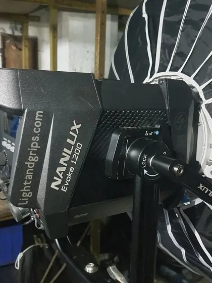 A close-up of the Nanlux Evoke 1200, a point-source LED that has become a go-to for cinematographers needing a powerful, punchy light that can be easily shaped with various accessories.