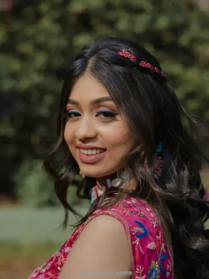 A pop of color for a vibrant Haldi ceremony. This look features a playful yet elegant blue winged liner paired with fresh, dewy skin. It’s a perfect example of how we can incorporate fun elements while maintaining a sophisticated bridal feel.