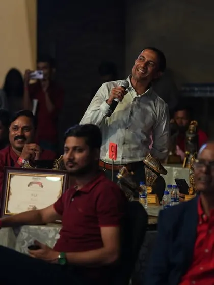 A shot from the audience's perspective during the MetroBrands show. This captures a moment of interaction, where a question from the crowd becomes part of the entertainment.