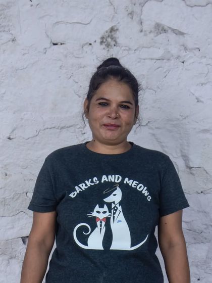 Another one of our dedicated caretakers, Sonu, who has a natural ability to make friends with every dog she meets.