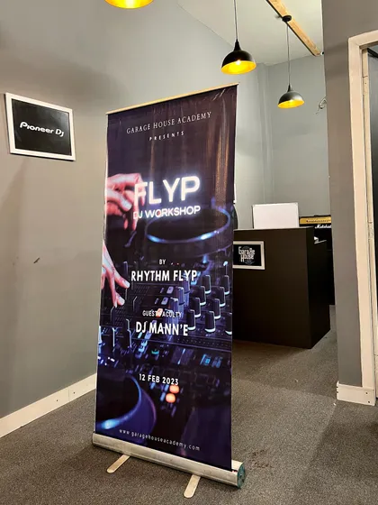 The standee banner from our FLYP DJ Workshop, which provides all the key details for attendees upon arrival at the venue.