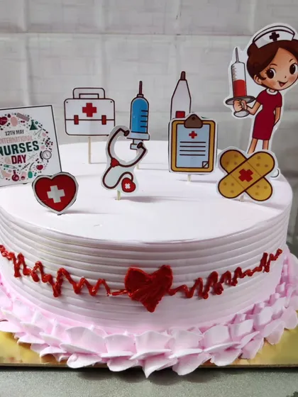 A special cake to celebrate Nurses Day. It's decorated with fun, edible toppers like a stethoscope, syringe, and first-aid kit.