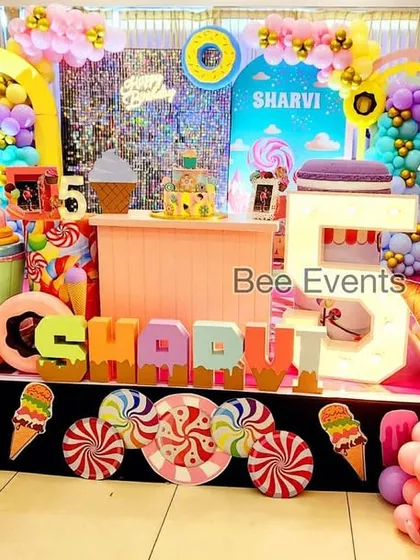 We bring imagination to life with our themed birthday parties. This vibrant Candyland setup for a 5th birthday was a sweet paradise, complete with giant candy props, ice cream cutouts, and colorful balloon arrangements.