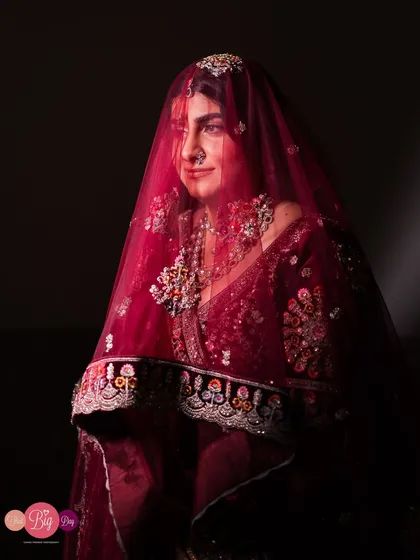A dramatic and intimate portrait of Hityshi and Pratik, where the bride's rich velvet lehenga and the couple's connection take centre stage.