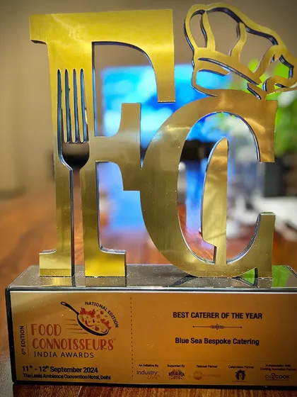 We are incredibly proud to be named Caterer of the Year at the Food Connoisseurs India National Edition 2024. This trophy represents the pinnacle of our team's passion and hard work.