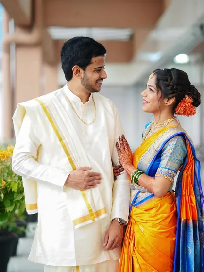 A candid glance filled with love and admiration. These are the in-between moments we cherish, capturing the authentic emotions of the wedding day.