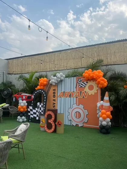 A wide view of our outdoor area set up for a construction party. We utilize the entire space to create different zones for activities, food, and photo opportunities.