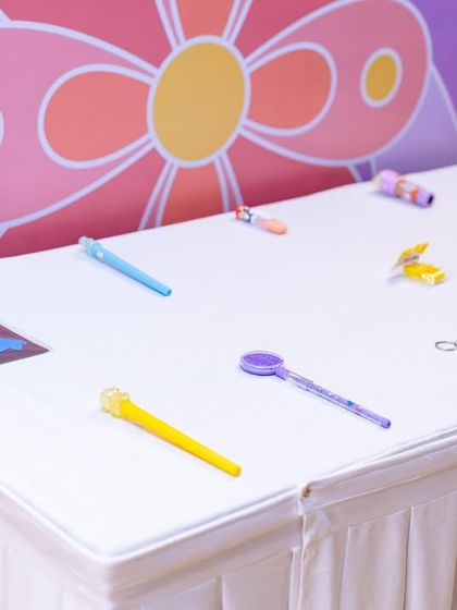 A table set up with butterfly-themed return gifts and party favors, showing my attention to detail in every aspect of the celebration.