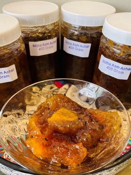 A bowl of my sweet mango pickle served from a fresh batch. These 400-gram jars are filled with this delicious preserve, which is a perfect side for parathas or mathris.