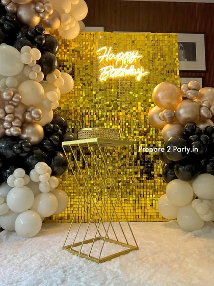 Another view of our gold sequin wall decoration, showing the placement of the cake pedestal. This setup ensures the cake cutting moment is just as glamorous as the rest of the party photos.