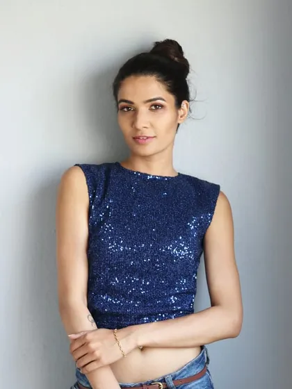 A custom crop top can completely change your wardrobe. I designed this royal blue sequin top to be a versatile statement piece. You can pair it with jeans for a night out or with a lehenga skirt for a more traditional event.
