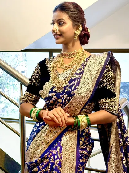 The combination of a velvet blouse with a silk Navari adds a touch of modern royalty. In my workshops, we explore how different fabrics and textures can be paired for a stunning effect.