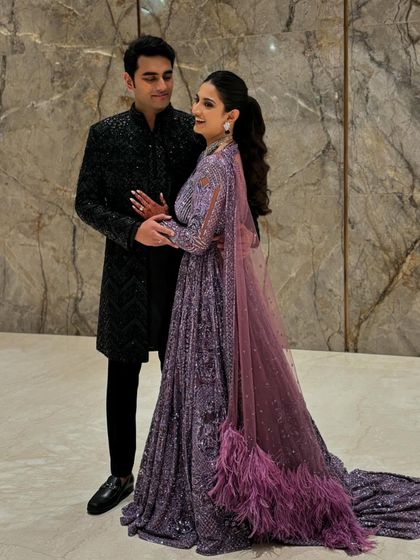 Another shot of Sree and Mohnish, showing the beautiful drape of her feathered dupatta. It's all about coordinated elegance for the sangeet night.