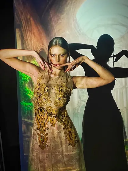 Another shot from the projector series. Here, the makeup and the model's pose create a dynamic shadow play, blending art, fashion, and makeup into one image.