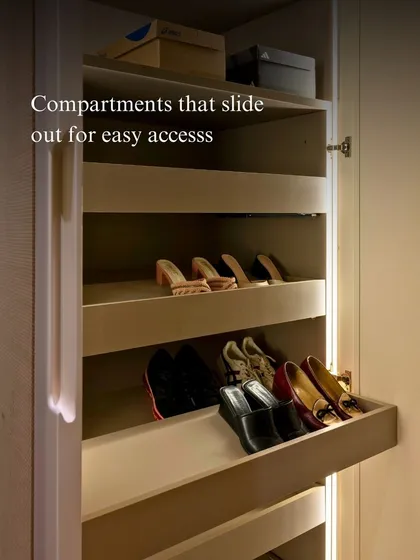 These compartments slide out for easy access to shoes. The angled shelves ensure each pair is visible and easy to grab, while the integrated lighting illuminates the collection beautifully.