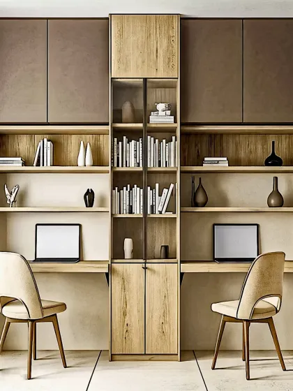 This dual home office setup is designed for productivity and harmony. The symmetrical layout provides two distinct workstations, each with its own laptop space, while the central and overhead shelving offers ample storage for books and office essentials, all in a cohesive, modern aesthetic.