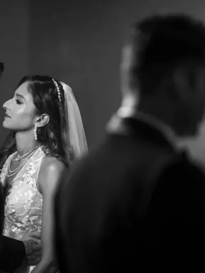 Another angle from our 1940s film-inspired shoot. The use of reflections and black and white creates a layered and artistic wedding portrait.