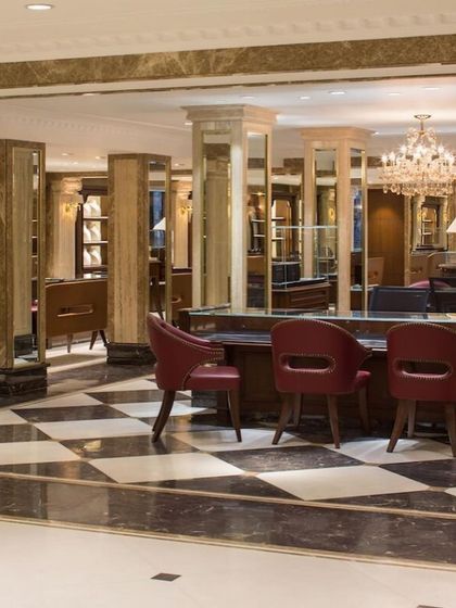 We creatively adapted the existing structure of the Anand Jewels building, using its many columns to define distinct retail zones. Mirrored surfaces on the columns and a checkerboard floor pattern create a dynamic play of reflections, enhancing the visual experience.