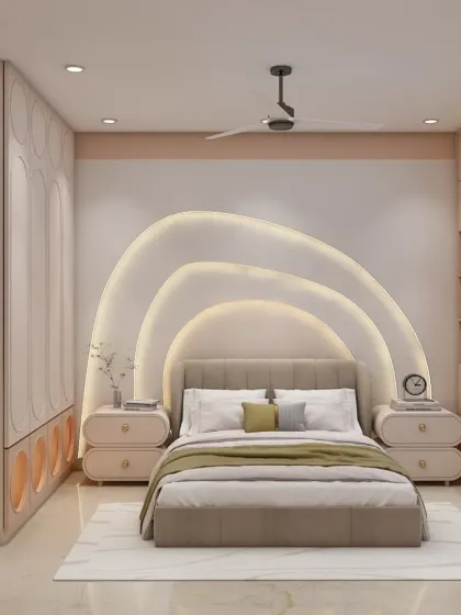 The bed in this room is set against a stunning, multi-layered arched headboard with integrated lighting. The design is modern, artistic, and makes a bold statement.