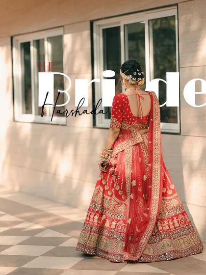 A beautiful back-shot of the bride, showcasing the intricate details of her red lehenga and hairstyle, with a modern text overlay.