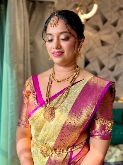 A close-up of this bride's makeup. I used soft, warm tones to enhance her features, creating a look that is both traditional and fresh.