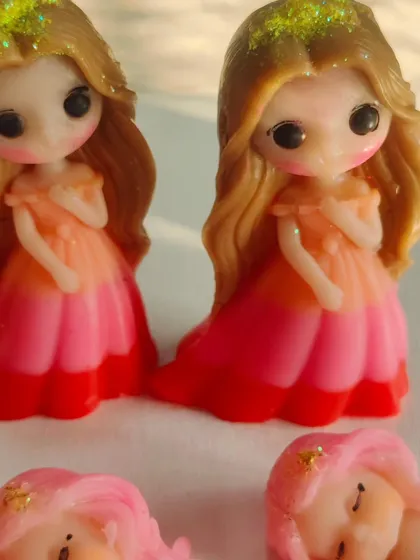A cute doll soap with an ombre dress, part of an order heading to Kuwait.