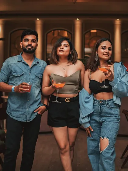 The air in my mansion buzzes with laughter and conversation. Here, friends gather to share stories over handcrafted cocktails, creating the vibrant, social atmosphere that defines an evening at Roxie.
