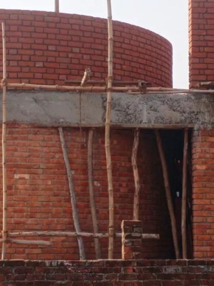 The details of the exposed brickwork at Ashadeep School were a labor of love, especially for a long-distance project in a remote village. The curved walls and patterned brick screens were designed to create a sense of warmth and texture.