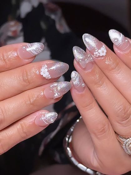 Another angle of this intricate silver cat-eye design, showing off the beautiful texture and shine.