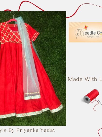 A classic red Anarkali suit with gold detailing on the bodice and hem. This is a timeless piece for any special occasion, made with love and attention to detail.