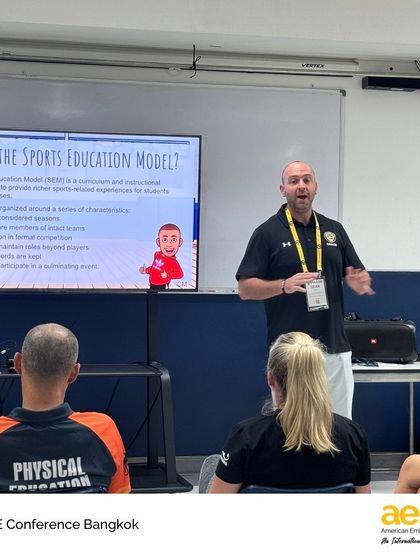 An AES educator explains the Sports Education Model to conference attendees. We are proud to be a school that not only implements but also shares innovative and effective teaching strategies.