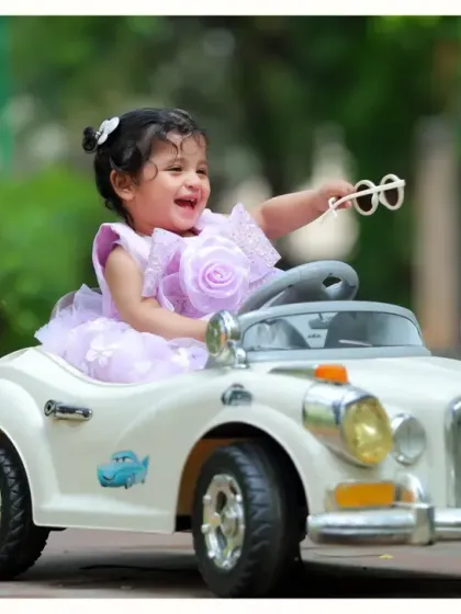 Let's go for a ride! Our outdoor sessions with fun props like this vintage toy car are perfect for capturing your child's laughter and adventurous spirit in beautiful, natural light.