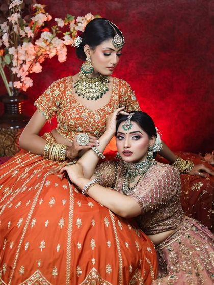 This photoshoot showcases two distinct but complementary bridal makeup looks. I used earthy tones and emerald green accents to create a cohesive and luxurious aesthetic, perfect for a high-fashion bridal editorial or for sisters getting ready together.