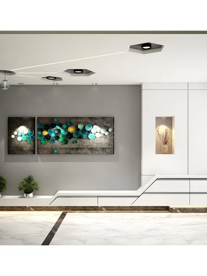 The entrance lobby of a luxury apartment, where we introduced a hexagonal geometry theme. The design includes a floating shoe storage unit and hexagonal ceiling lights that guide you into the home.