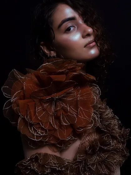 A final portrait from 'The Sea of Life' series, capturing the ethereal glow of the makeup and the texture of the wet hair. This look is all about creating a luminous, otherworldly feel.
