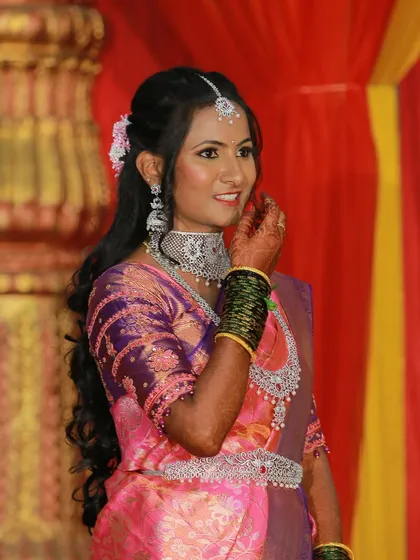 A beautiful candid shot of a guest enjoying a family function. My goal is to capture the natural smiles and real emotions throughout the event, creating an album that tells the complete story of your day.