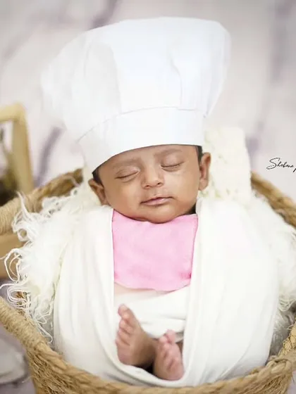 Even the tiniest babies can be a little chef in the making. This newborn is dreaming of future culinary creations in this adorable themed setup.