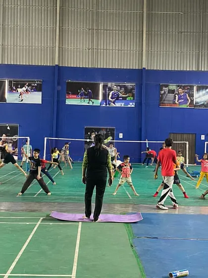 A wide view of our group yoga and stretching session. We dedicate time to flexibility and mental focus, which are essential for preventing injuries and maintaining composure during intense games.