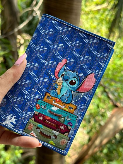 Another shot of the custom Goyard passport cover with the Stitch design. The detail on the little travel bags is my favorite part.