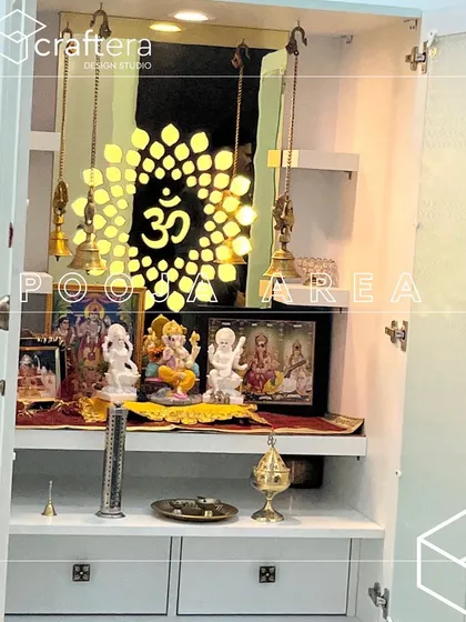 A pooja unit should be a peaceful and sacred corner in your home. I designed this compact unit with an illuminated 'Om' symbol and traditional bells, creating a serene space for prayer. The design ensures it is both beautiful and functional, fitting perfectly within the home's modern aesthetic.