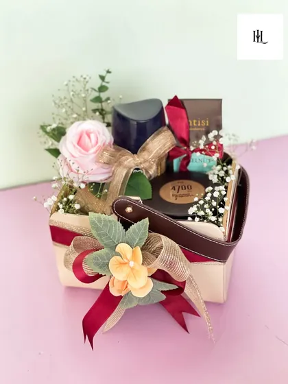 Another view of the mini gourmet hamper, showing the curated items nestled inside. It's a perfect blend of sweetness, freshness, and charm for any small celebration.